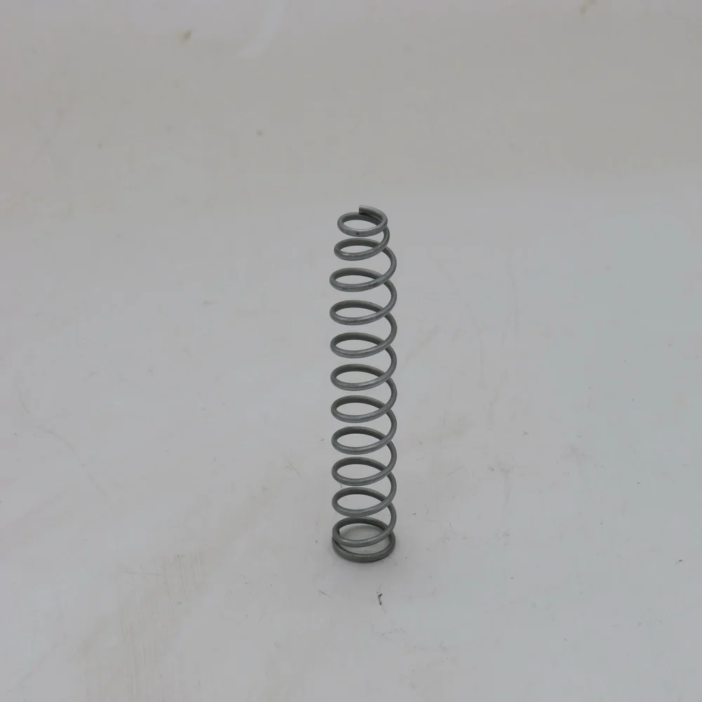 Feder für Druckknopf